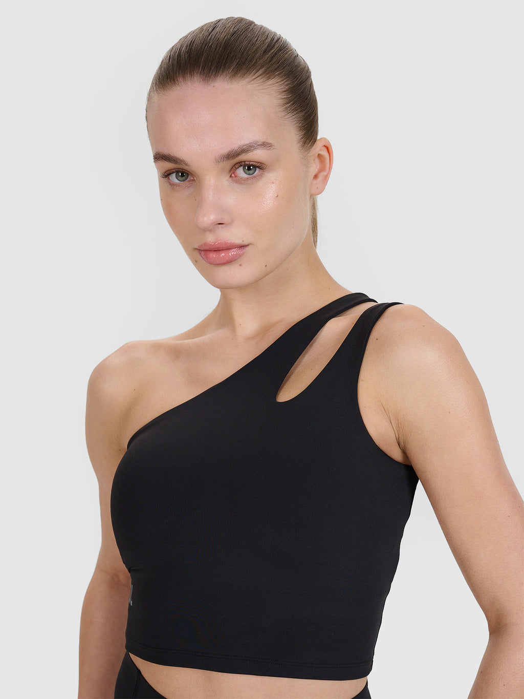 Crop top treningowy na jedno ramię 4F x Anna Lewandowska