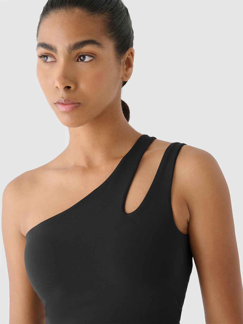 Crop top treningowy na jedno ramię 4F x Anna Lewandowska