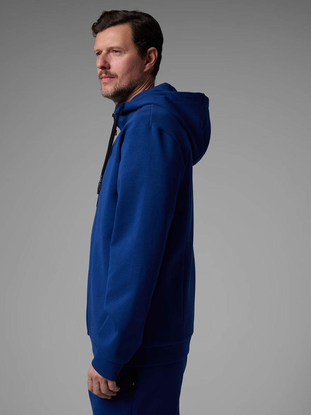 Bluza dresowa regular z kapturem męska 4F x Robert Lewandowski