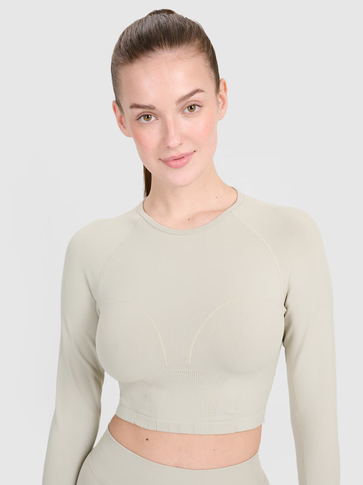 Longsleeve treningowy crop-top z wycięciem na plecach damski