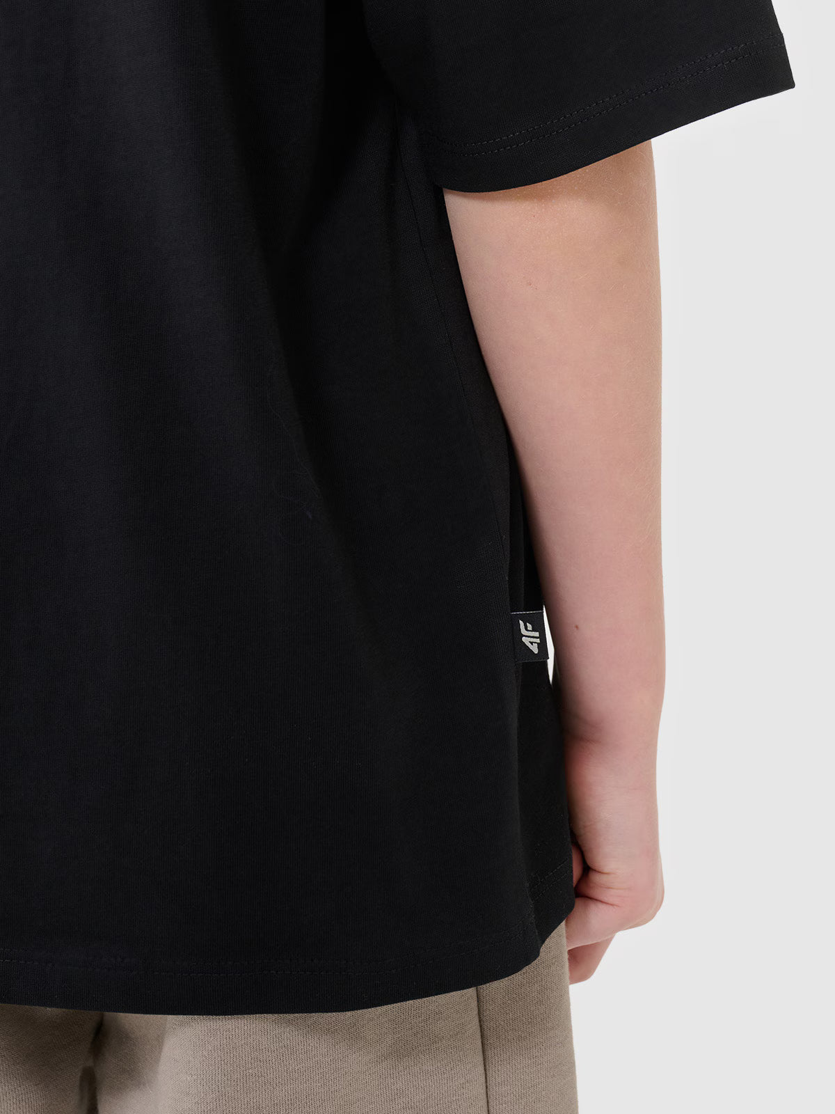 T-shirt oversize z napisem chłopięcy