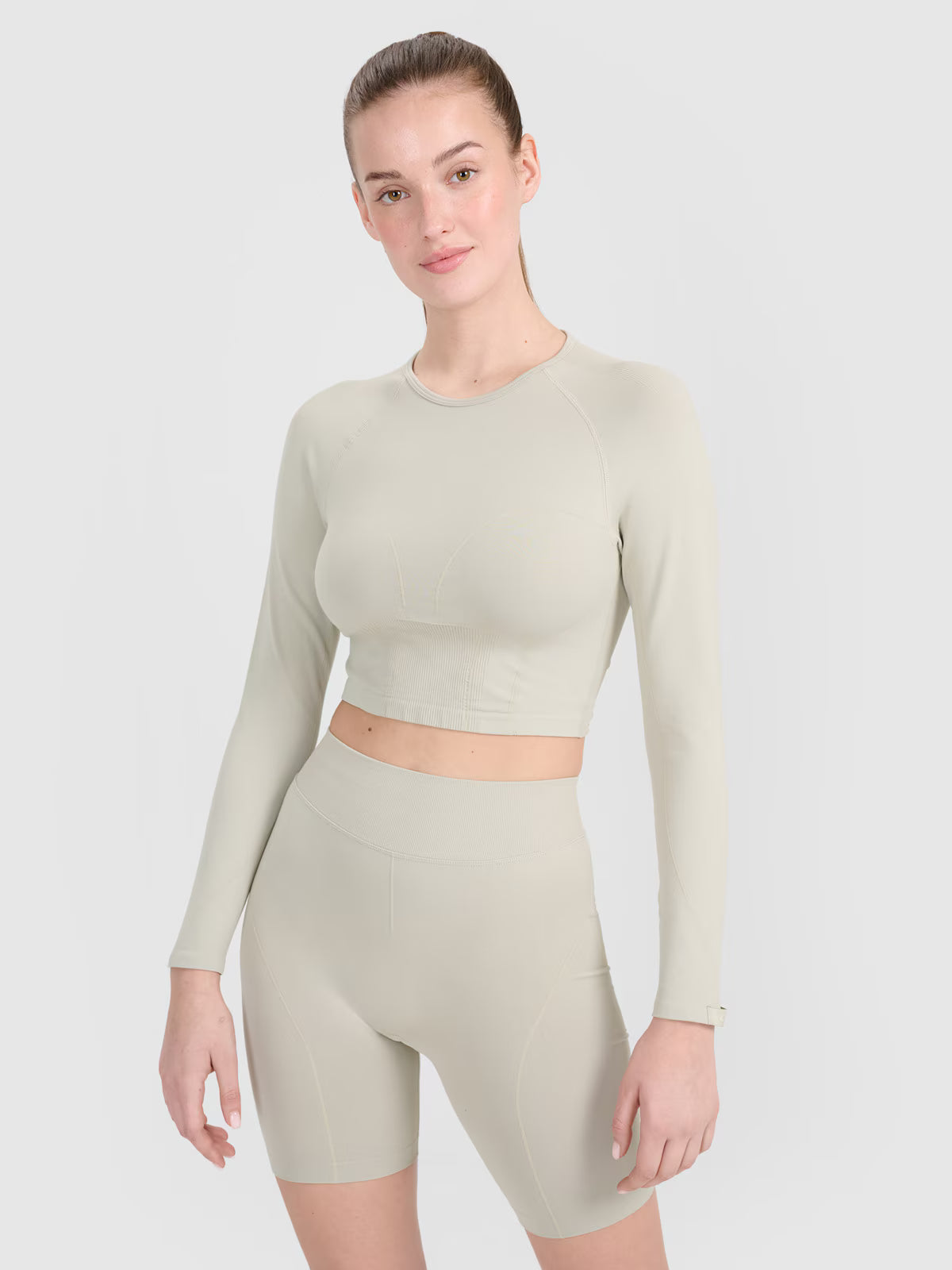 Longsleeve treningowy crop-top z wycięciem na plecach damski