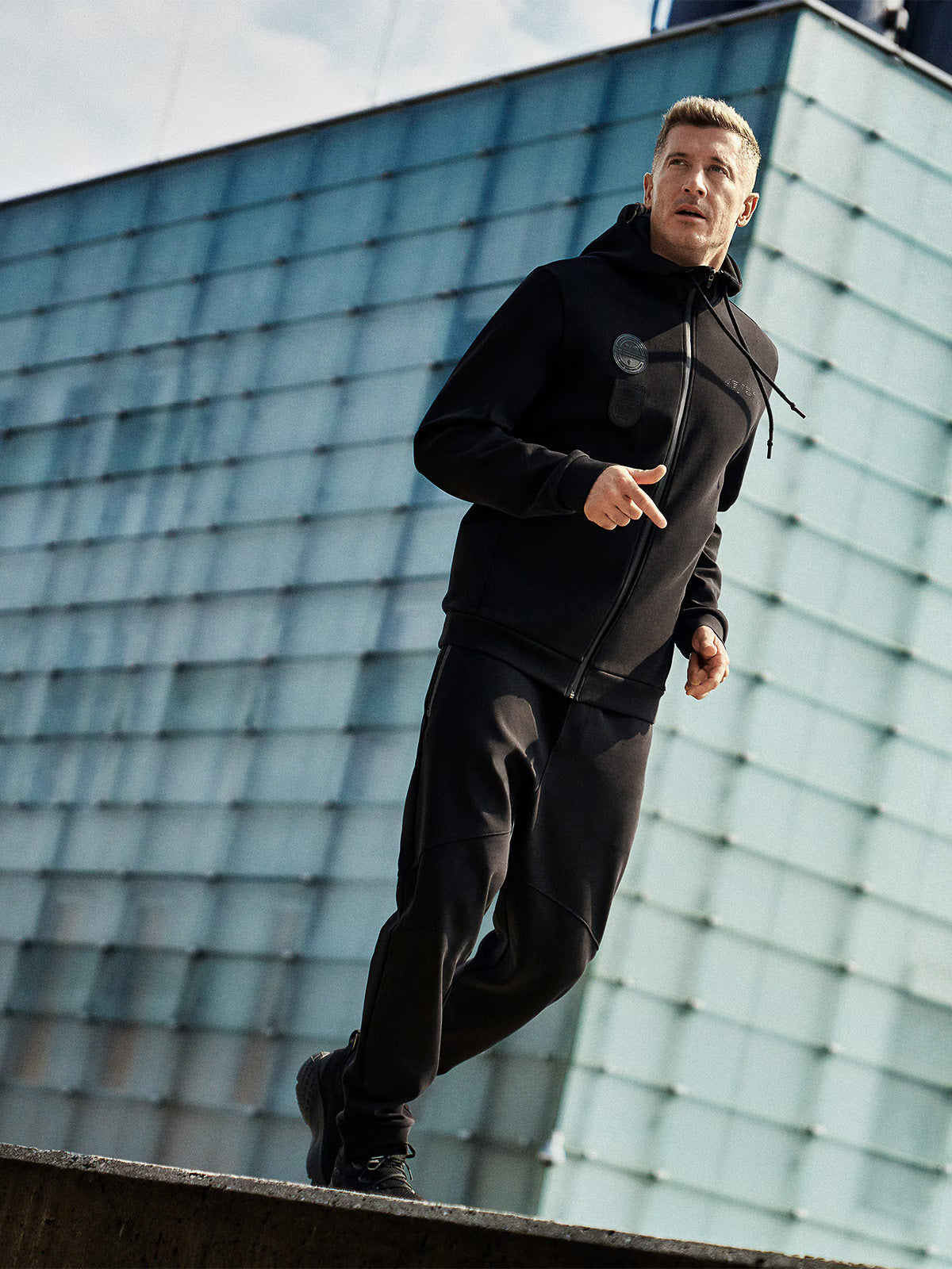 Bluza dresowa regular z kapturem męska 4F x Robert Lewandowski