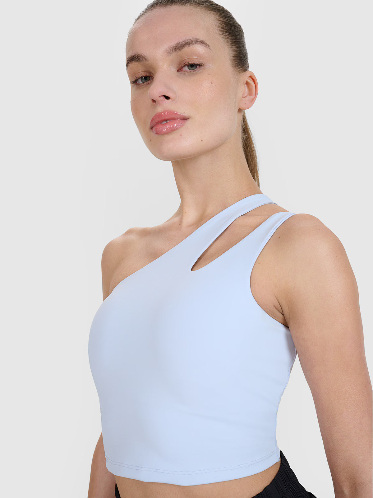 Crop top treningowy na jedno ramię 4F x Anna Lewandowska